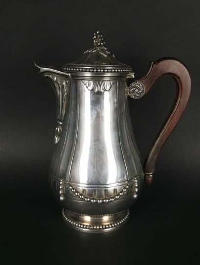null PUIFORCAT.
Silver tea and coffee service on pedestal decorated with a frieze...