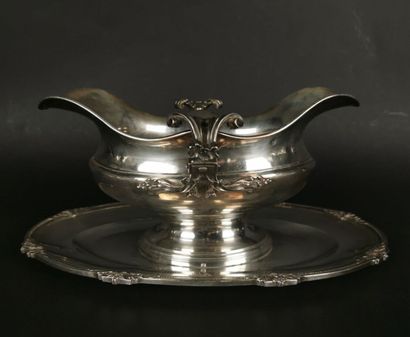 null CARDEILHAC.
Sauceboat with a silver plate decorated with acanthus leaves, engraved...