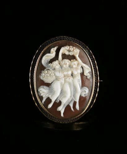 null Brooch-mounted cameo depicting the Three Graces, set in finely openwork yellow...