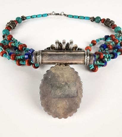 null Four-row silver necklace with blue, red and turquoise-tinted stones, adorned...