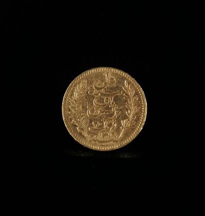 null 20 franc gold coin from Tunisia.
1892.
6.46 grams