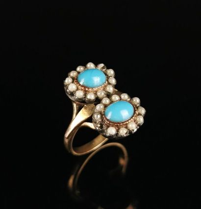 null Yellow gold and silver double bezel ring set with turquoise cabochons encircled...