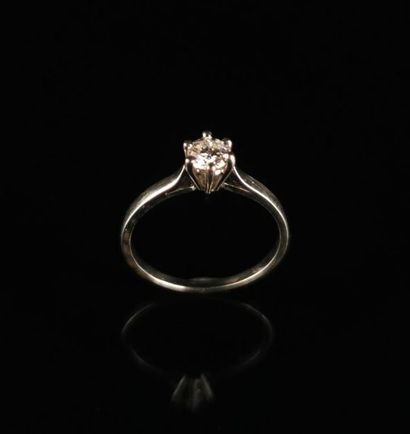 null White gold solitaire ring set with a brilliant-cut diamond weighing approx....