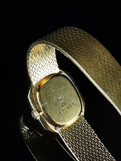 null Ladies' wristwatch in yellow gold, the case adorned with diamonds and surrounded...
