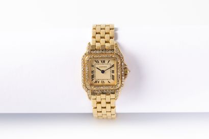 null CARTIER, Paris.
Panthère" model ladies' wristwatch with yellow gold case and...