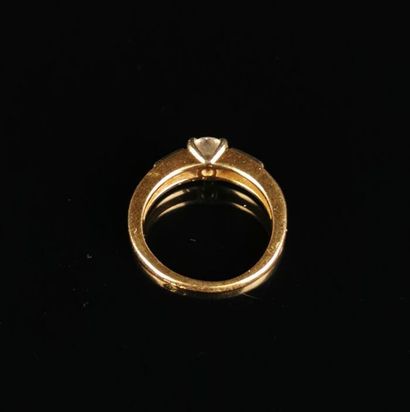 null Yellow and white gold ring set with a brilliant-cut diamond weighing approx....