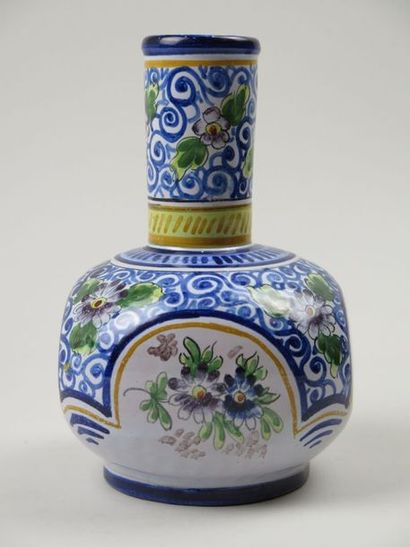 COOTARD Vase à quatre panses en faience à décor floral, signé au revers. H_18,5 ...