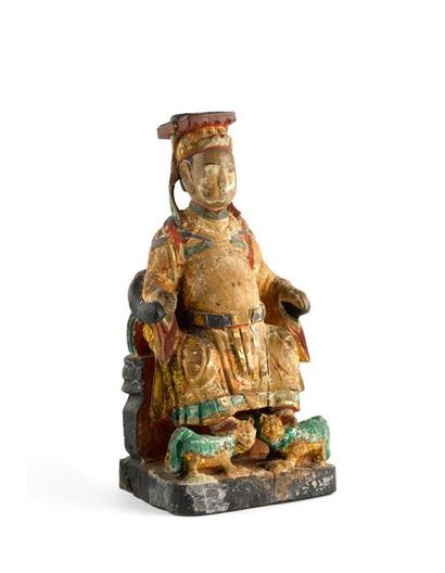 CHINE - XIXème siècle 
Statuette de dignitaire en bois laqué polychrome, représenté...