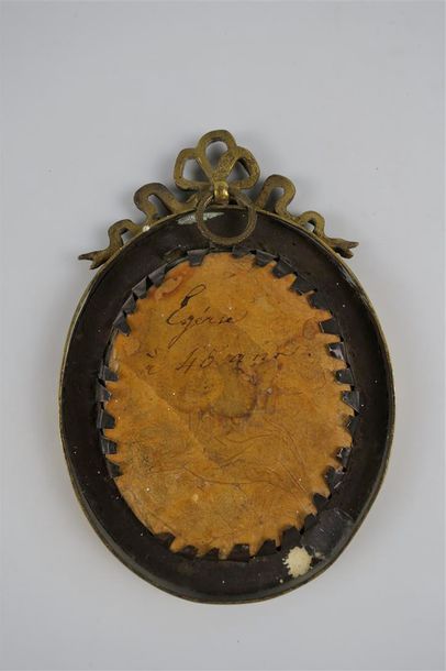 MINIATURE L. GIRBAUD Portrait de femme. Miniature ovale, signée et datée 1852. H_7,8...