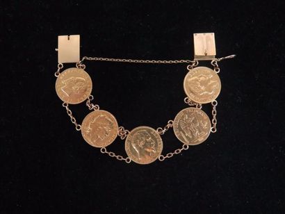 null Bracelet articulé en or jaune 18K (750°/00) composé de cinq pièces de 20 francs

Poids...