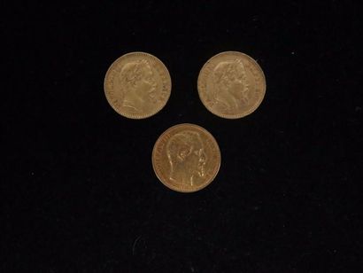null Trois pièces de 20 francs or :

deux Napoléon tête laurée 1863 et 1865

une...