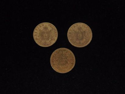 null Trois pièces de 20 francs or :

deux Napoléon tête laurée 1863 et 1865

une...