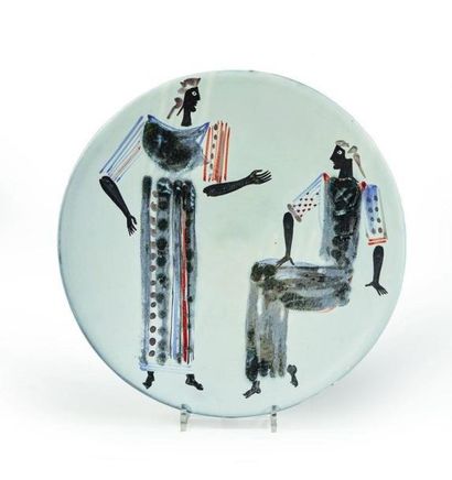 null Roger CAPRON (1922-2006)

Grand plat en céramique à décor polychrome d'un couple.

Signé...