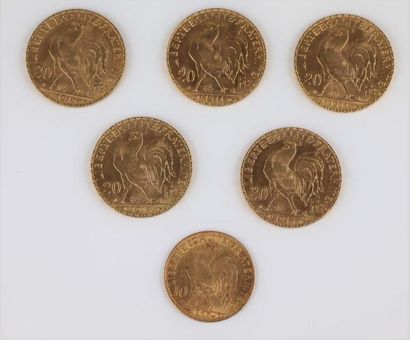null Cinq pièces de 20 francs or, Marianne et coq, 1913 et 1914 et une pièce de 10...