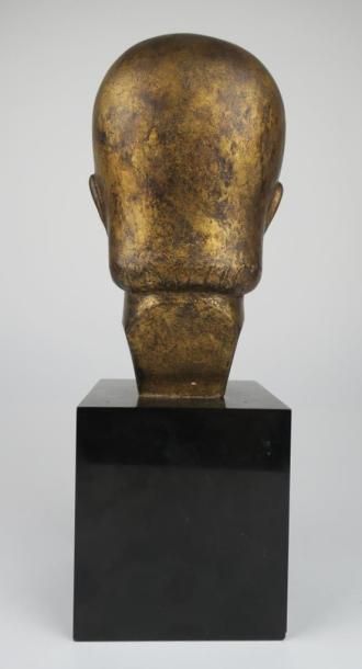 null Raymond RAFFOUR (1901-1988).

Tête de femme.

Bronze à patine mordorée, sur...