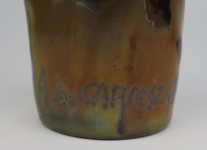 null Amédée de CARANZA (1840-1912).

Vase rouleau en verre irisé à décor de branchages...