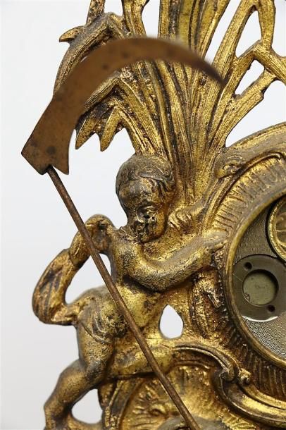 null Porte-montre en bronze ciselé et doré figurant Chronos.

Travail du XVIIIème...