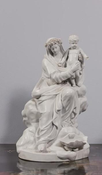 null PARIS.

Groupe en biscuit représentant une Vierge à l'enfant.

XIXème siècle.

H_32...