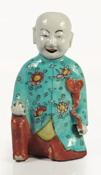 null CHINE, Epoque Jiaqing, XIXème siècle.

Statuette de Hehe en porcelaine famille...