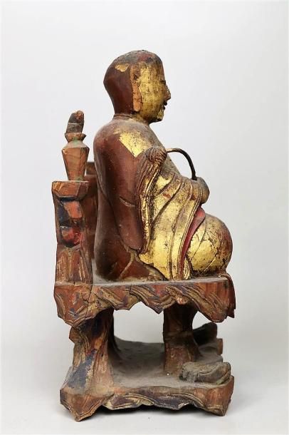 null Statue de moine en bois laqué or et rouge

Chine, dynastie Qing, XIXème siècle

Représenté...