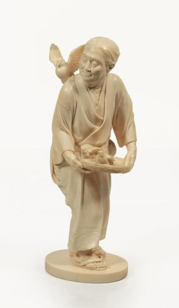 null JAPON, Ecole de Tokyo, vers 1900.

Groupe en ivoire sculpté.

Représentant un...