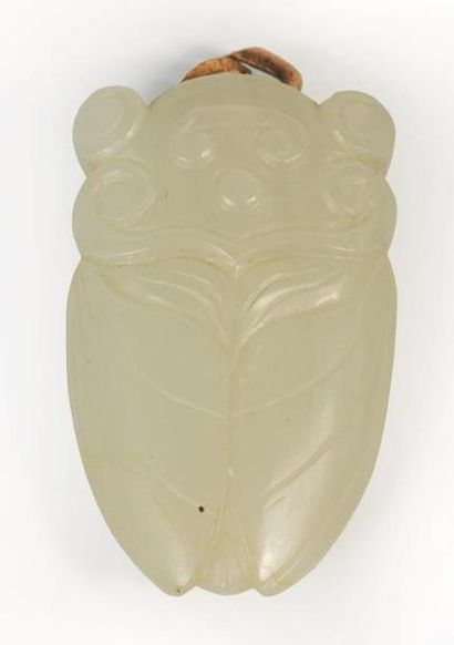 CHINE, XXème siècle.

Pendentif en jade blanc...