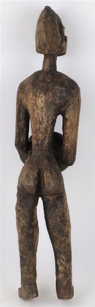null BAMANA (Mali). _x000D_

Statuette représentant une femme portant une calebasse._x000D_

Usure...