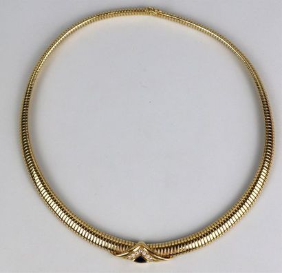 null Parure en or jaune comprenant un collier maille tubogaz et un bracelet rigide...