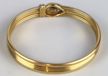 null Parure en or jaune comprenant un collier maille tubogaz et un bracelet rigide...