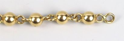 null Bracelet en or jaune composé de perles et de maillons. 

L_18,5 cm, 6,52 grammes,...