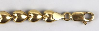 null Bracelet en or jaune, à motif de grains de café.

L_17,5 cm, 7,61 grammes, or...