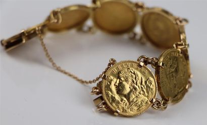 null Bracelet en or jaune composé de huit pièces en or françaises et étrangères.

L_19cm.

72,16...