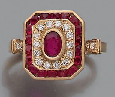 null 18K (750) yellow gold ring adorned with an oval ruby in a double octagonal frame...