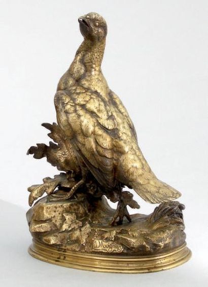 Jules Moigniez (1835-1894) Perdrix au rappel. bronze à patine dorée. Signé sur la...