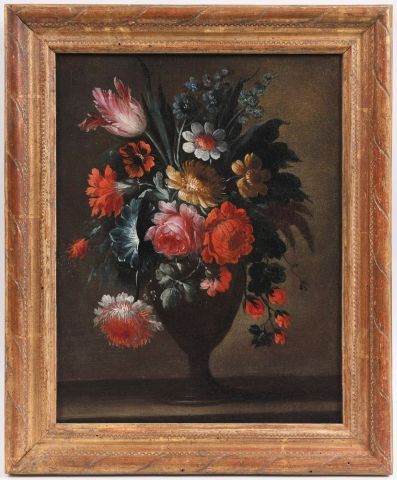 Ecole française du XVIIIè Bouquet de fleurs dans un vase reposant sur un entablement.
Huile...