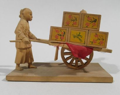 null Sculpture en bois d'un homme et son fils transportant dans une charrette des...