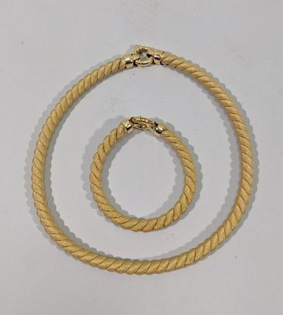 null Parure composée d'un collier et d'un bracelet en or jaune 18K (750/oo) maille...