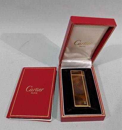 null CARTRIDGE - Model MUST. Gas lighter in gold plated metal and brown lacquer....