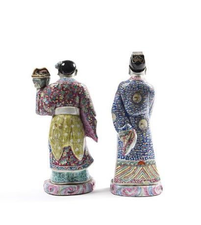 null Two statuettes of characters in polychrome porcelain China, 20th century Represented...