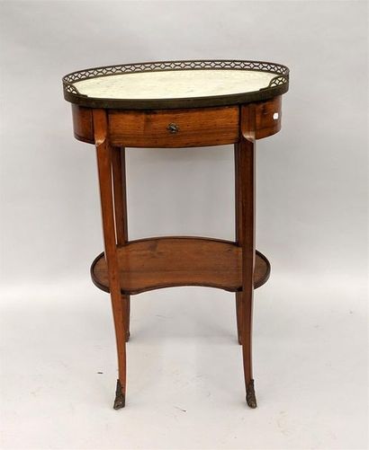 null Small middle table, opening with a belt drawer with white marble top. It rests...