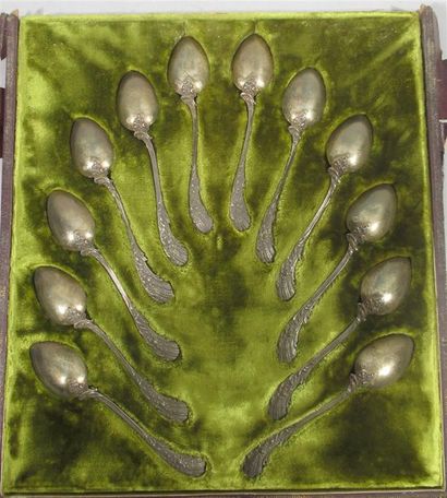 null A series of twelve small silver spoons in vermeille silver stamp Minerve, angel...