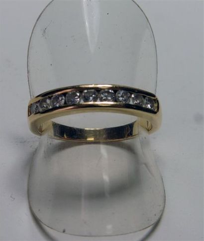 null American HALF-ALLIANCE in 18 K (750/oo) yellow gold set with brilliant-cut diamonds....