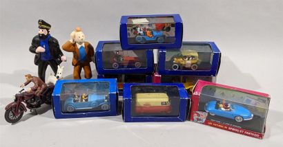 null TINTIN Lot comprenant 6 véhicules de collection dans leur boite et trois figurines...
