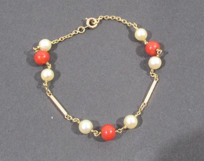 null Bracelet en or jaune 18 K (750/oo) orné de perles fantaisie et de perles de...
