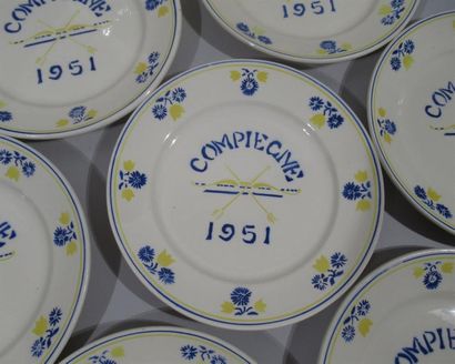 null BADONVILLER
Suite of 11 semi-porcelain plates with blue and yellow decoration,...