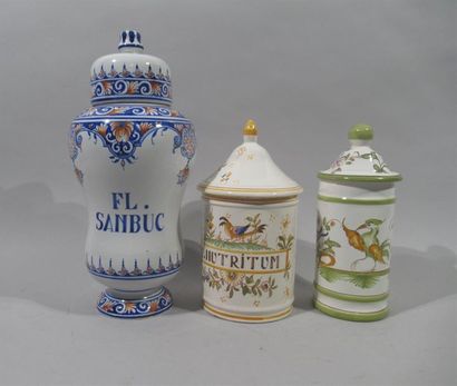 null DELFT? 
Medicine jar in faince with blue and red decoration and indicating "FL....