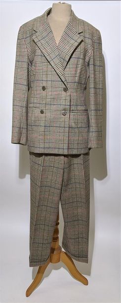 null GEORGES RECH
Tailleur en laine Prince-de-Galles composé d'une veste droite à...