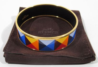null HERMES PARIS - Bracelet rigide en métal doré à décor émaillé de triangles polychromes...