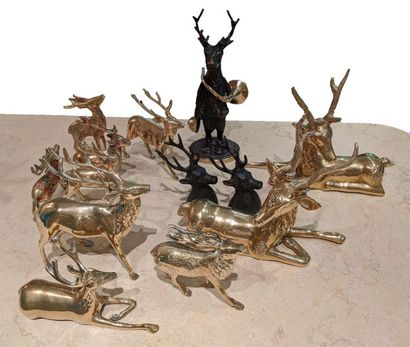 null Set of metal sculptures with golden and brown patinas representing deer. 
Height...