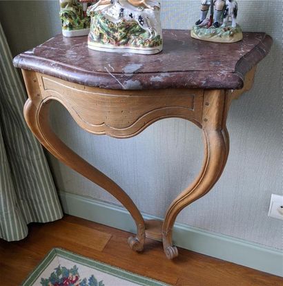 null Lot comprising :
 - a small console in ceruse wood, the belt molded in embrace,...